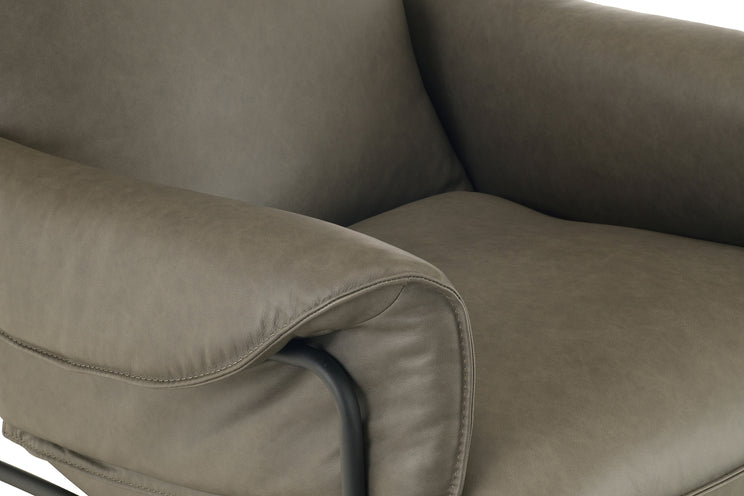 Close-up of a brown leather armchair